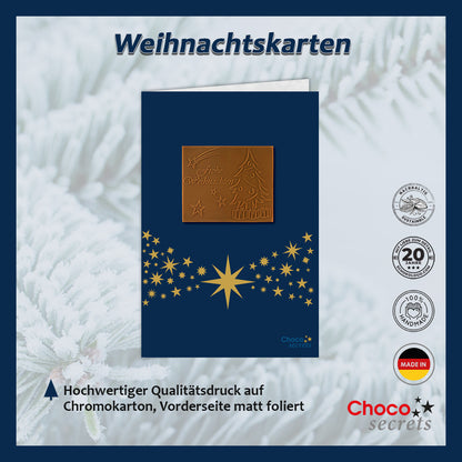 Christmas cards with embossed chocolate in a gold box, set of 5, card design: dark blue sky with star band, embossed chocolate: "Frohe Weihnachten", envelope in gold