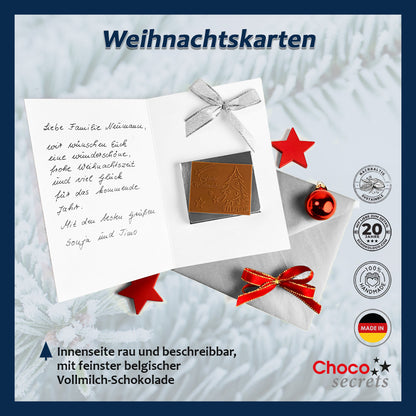 Christmas cards with embossed chocolate in a silver box, set of 5, card design: dark blue sky with Christmas tree, embossed chocolate: "Frohe Weihnachten", envelope in silver